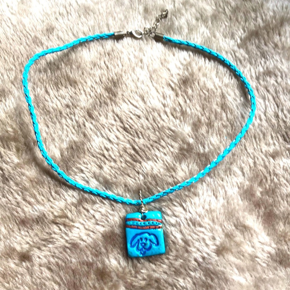Blue necklace with dog charm
